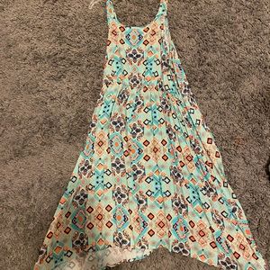 Mid length dress, lots of different pastel colors and flowy.
